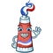Toothpaste Tube Cartoon Waving and Wearing Braces
