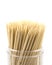 Toothpicks bamboo in a box close-up. Wooden toothpicks in a box isolated on a white background. Toothpicks made of