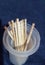 Toothpicks in a small plastic container