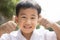 Toothy smiling face of asian children happiness emotion