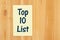 Top 10 list message on a notepad on wood desk