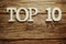 Top 10 word alphabet letters on wooden background