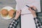 Top above overhead close up view photo of lady`s person`s hands pointing on documents in hands. Concept of workspace. Young worker