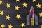 Top above overhead view photo of drawn spaceship isolated on blackboard background with yellow stars stickers