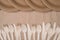 Top above overhead view photo of rows of wooden cutlery and paper plates isolated on craft paper background table