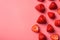 Top above overhead view sideways photo of strawberries isolated on pink background with empty blank space