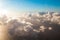 Top aerial view background on blue sky, bright sun white clouds