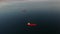 Top aerial view of the large crude oil tanker ship sailing in sea to loading port