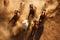 Top angle shot of a herd of horses running on the sand in the dust