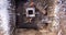 Top ascending aerial view of a foundation of a frame house in winter and working laborers. Snowy day