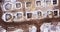 Top ascending aerial view of a foundation of a frame house in winter and working laborers. Snowy day