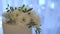 Top ball of wedding cake decorations with fresh live white flowers