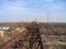 The top bridge of a rusty gantry crane