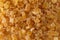 Top close view of a dried sugar coated diced peaches