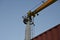 Top of column jib crane of the merchant cargo container vessel.