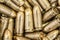 Top detail macro view of large group of gun bullets