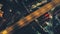 Top down aerial of night traffic highway at illuminated streets closeup. Urban transportation