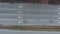 Top down aerial shot of group of people running marathon on empty road