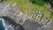 Top down aerial of traditional jukung boats resting on beach in Bali. Amed beach in Bali Indonesia with Jukung fishing