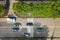 Top down aerial view of busy street with moving cars traffic and zebra road pedestrian crosswalk