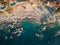 Top down aerial view of Conchas Chinas Beach in Puerto Vallarta Mexico showing rocks, sand, water