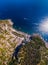 Top down aerial view from distance, general view of the area Manarola and Riomaggiore. boats and rocky beach. Province of La