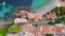 Top down aerial view, flight over the rooftops of a Mediterranean tourist town