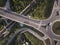 Top down aerial view of a traffic roundabout on a main road