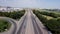 Top down aerial view of transportation highway overpass, ringway, roundabout