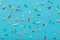 top down of colorful sprinkles over blue, festive decoration for holiday and party time