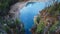 Top-down drone view above the stormy azure water a stone gorge of Athabaska River, Alberta, Canada