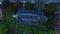 Top down drone view of a church and cemetery in a suburban street