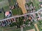 Top down drone view, small hungarian village with asphalt road