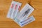 A top down portrait of multiple packages of different acupuncture needles, ready to use on someone with health issues. There are