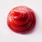 Top down view of decorative twist of tomato sauce