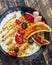 A top-down view of a healthy bowl of porridge and glazed banana