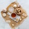 Top down view of honey and garlic ingredients on a piece of rustic burlap.