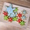 Top down view of mini snowflake sugar cookies for winter or Christmas