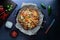 Top down view of a platter of hot cactus cut nachos fresh out of the oven.