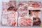 Top down view of red meat package stacks in a box