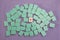 Top down view of the reverse down side of a set of green turquoise Mah Jong game tiles