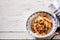 Top down view on risotto primavera and veggies bowl