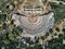 Top drone view of the Historic open-air theater in the ancient city of Patara. aerial shot of ancient ruins in turkey