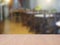 Top empty wood table on blurred abstract cafe background.