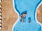 Top high aerial view of group of female caucasian people enjoying the pool with coloured trendy lilos mattress - summer holiday