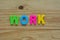 Top lay of the word Work on a wooden background