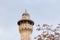 The top  of the minaret of the Sheikh Reihan Mosque towers over the walls of the Temple Mount in the old city of Jerusalem, in