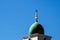 the top of a mosque minaret with a cupola dome