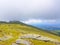 Top of the mountain of La Rhune in the Atlantic Pyrenees. Border between Spain and France. Day with clouds and fog that cover the