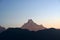 Top of Mt. Machapuchare is a mountain in the Annapurna Himalayas of north central Nepal seen from Poon Hill, Nepal